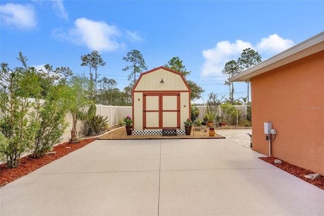 5 Zorlou Ct, Palm Coast, FL 32164 - fenced backyard featuring a storage unit and a patio area