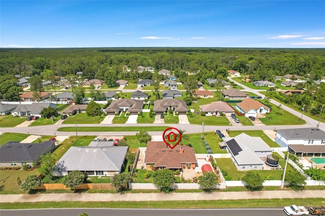 5 Zorlou Ct, Palm Coast, FL 32164 - aerial perspective of suburban area with a heavily wooded area