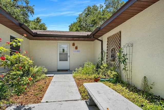 1108 Northside Dr, Ormond Beach, FL 32174 - property entrance featuring stucco siding