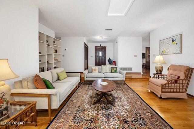 1108 Northside Dr, Ormond Beach, FL 32174 - living room featuring wood finished floors