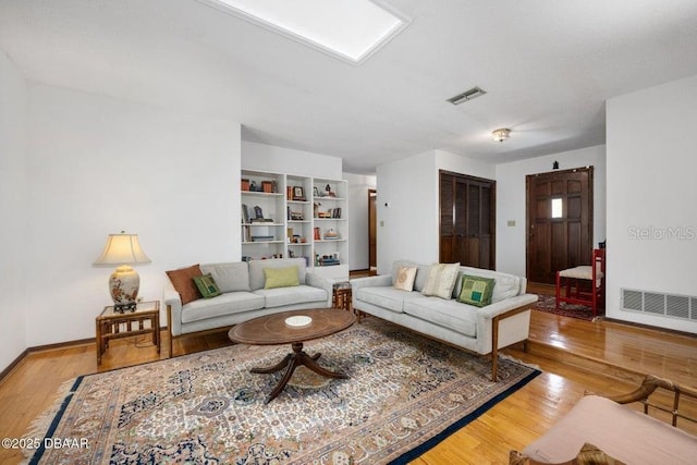 1108 Northside Dr, Ormond Beach, FL 32174 - living area with wood finished floors and baseboards