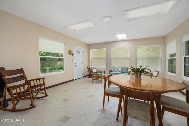 1108 Northside Dr, Ormond Beach, FL 32174 - dining room with baseboards