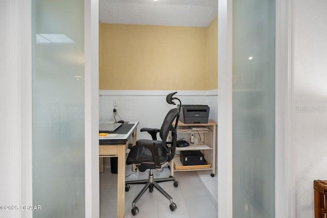 1108 Northside Dr, Ormond Beach, FL 32174 - tiled office space featuring a textured ceiling