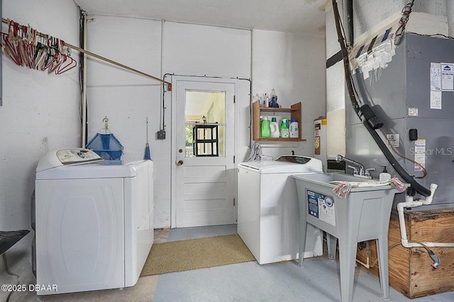 1108 Northside Dr, Ormond Beach, FL 32174 - laundry area with washer and clothes dryer and heating unit