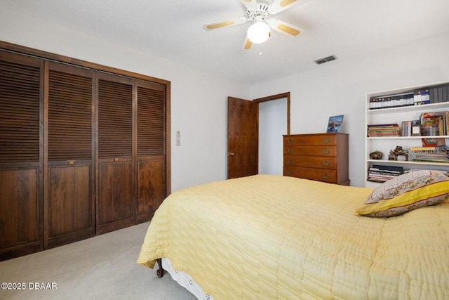 1108 Northside Dr, Ormond Beach, FL 32174 - bedroom featuring a closet, light carpet, and ceiling fan