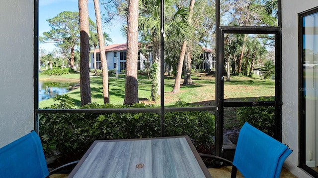 4655 46th Street Ct W Unit 101, Bradenton, FL 34210 - sunroom / solarium with a water view