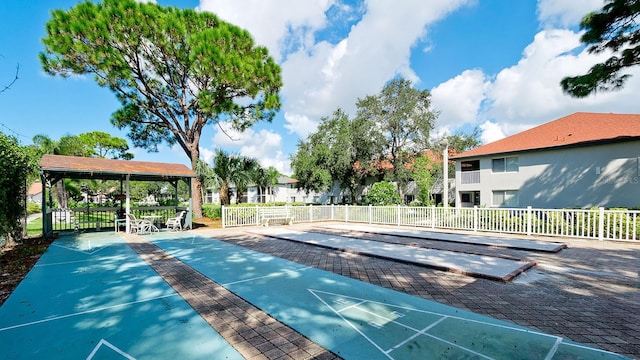 4655 46th Street Ct W Unit 101, Bradenton, FL 34210 - surrounding community with shuffleboard