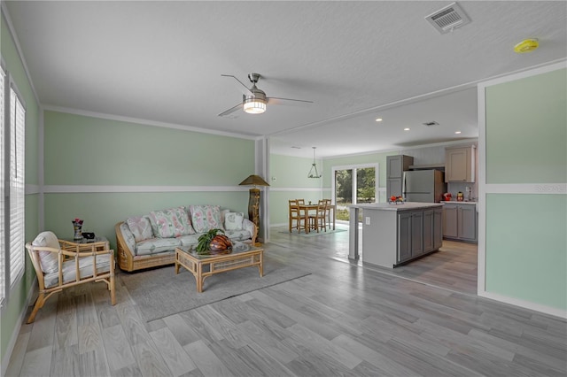 606 Ofarrell Ave, Interlachen, FL 32148 - living area featuring ceiling fan, light wood-style flooring, and recessed lighting