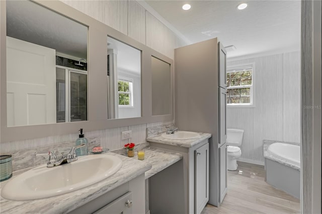 606 Ofarrell Ave, Interlachen, FL 32148 - full bath featuring vanity, a bath, a shower with door, and recessed lighting