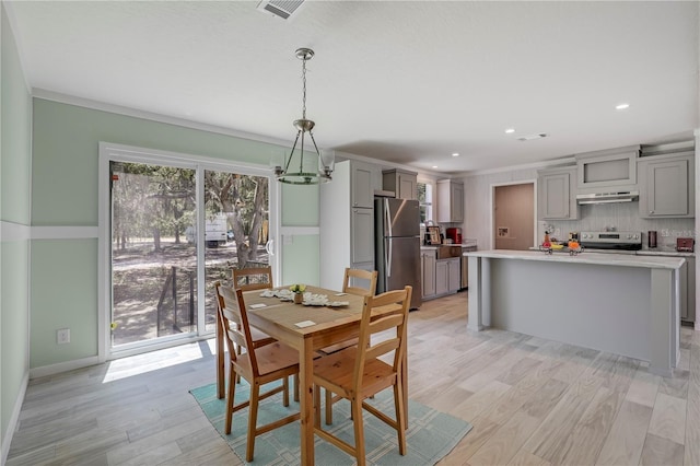 606 Ofarrell Ave, Interlachen, FL 32148 - dining space with light wood-style floors, a chandelier, and recessed lighting