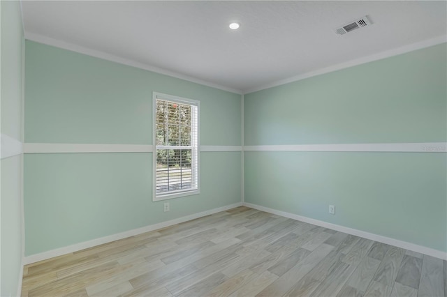 606 Ofarrell Ave, Interlachen, FL 32148 - unfurnished room with wood finished floors, recessed lighting, and ornamental molding