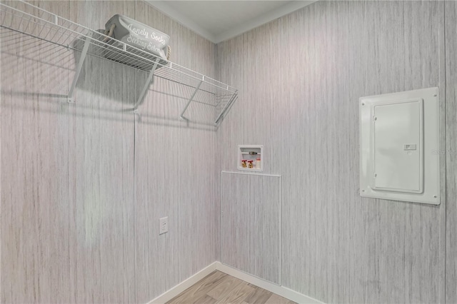 606 Ofarrell Ave, Interlachen, FL 32148 - laundry room featuring hookup for a washing machine, electric panel, and wood finished floors