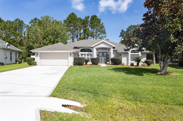 7 Lewis Shire Way, Palm Coast, FL 32137 - single story home with a garage, stucco siding, driveway, a front yard, and french doors