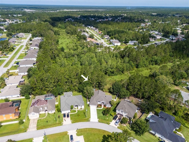 7 Lewis Shire Way, Palm Coast, FL 32137 - view of property location with nearby suburban area and a forest