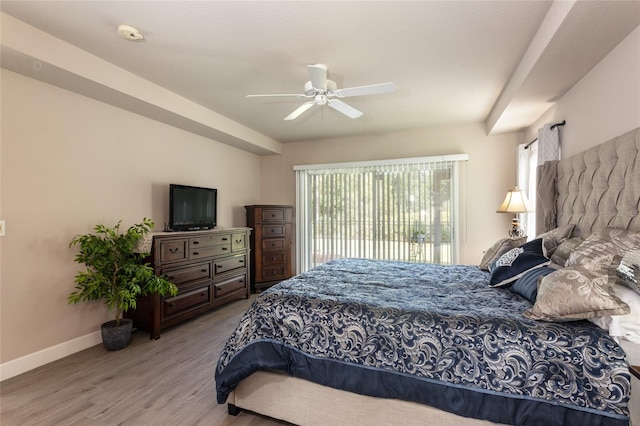 7 Lewis Shire Way, Palm Coast, FL 32137 - bedroom with wood finished floors, access to exterior, and ceiling fan