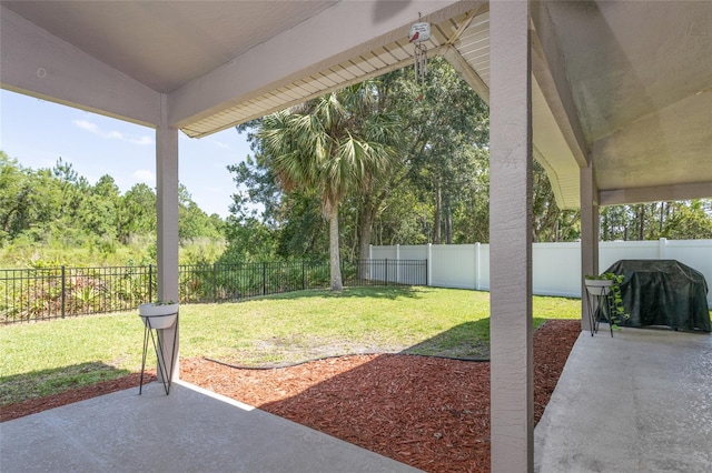7 Lewis Shire Way, Palm Coast, FL 32137 - fenced backyard with a patio area