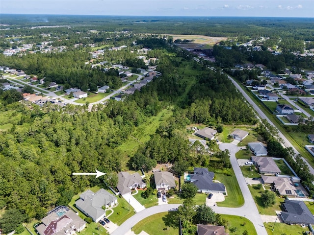7 Lewis Shire Way, Palm Coast, FL 32137 - aerial view of property and surrounding area with nearby suburban area and a heavily wooded area