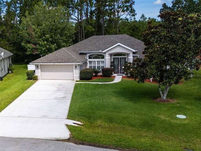 7 Lewis Shire Way, Palm Coast, FL 32137 - single story home featuring an attached garage, roof with shingles, driveway, stucco siding, and french doors