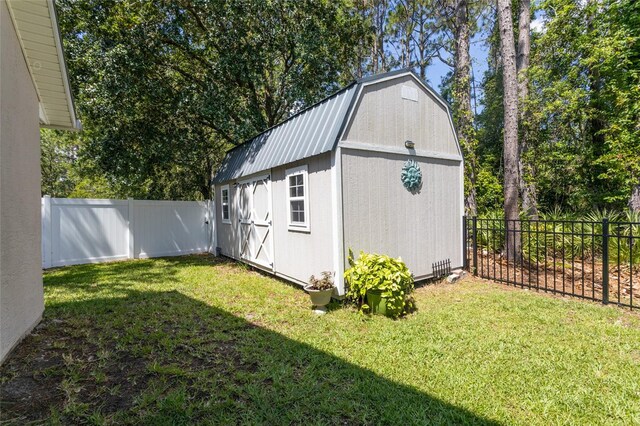 7 Lewis Shire Way, Palm Coast, FL 32137 - view of shed featuring a fenced backyard