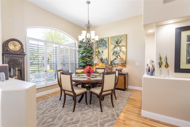 20 Long Pl, Palm Coast, FL 32137 - dining room with plenty of natural light, light wood-type flooring, and a chandelier