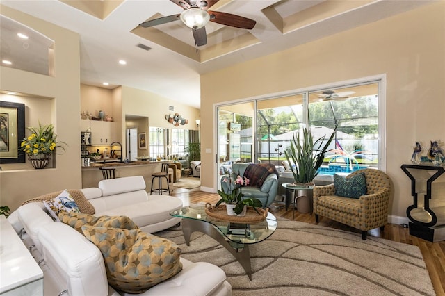 20 Long Pl, Palm Coast, FL 32137 - living area with ceiling fan, wood finished floors, recessed lighting, coffered ceiling, and a high ceiling