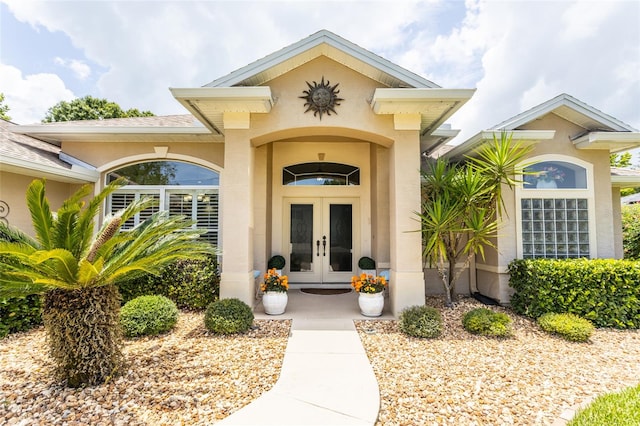20 Long Pl, Palm Coast, FL 32137 - property entrance featuring french doors and stucco siding