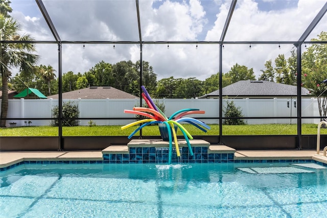 20 Long Pl, Palm Coast, FL 32137 - view of swimming pool featuring glass enclosure and a fenced backyard