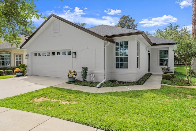 143 W Waterside Pkwy, Palm Coast, FL 32137 - view of property exterior with a garage, concrete driveway, stucco siding, and a lawn