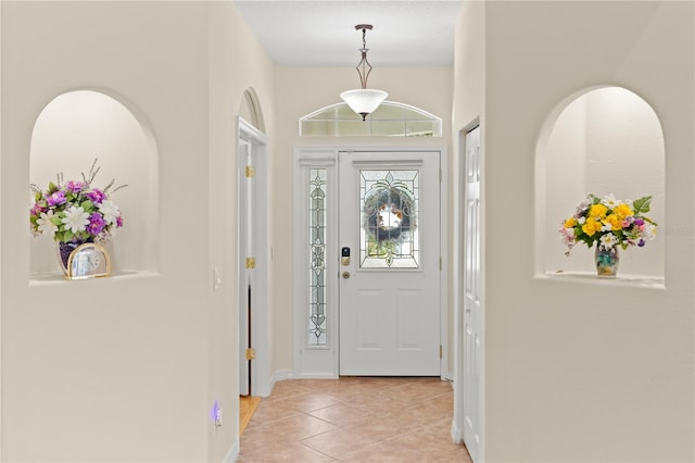 143 W Waterside Pkwy, Palm Coast, FL 32137 - foyer entrance featuring light tile patterned floors and baseboards