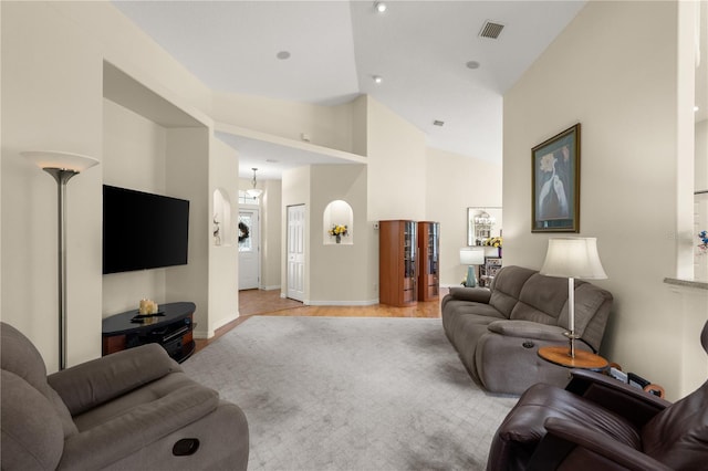 143 W Waterside Pkwy, Palm Coast, FL 32137 - living room with light wood-type flooring and high vaulted ceiling