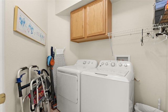 143 W Waterside Pkwy, Palm Coast, FL 32137 - washroom with cabinet space and washer and clothes dryer