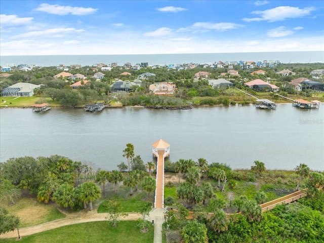 143 W Waterside Pkwy, Palm Coast, FL 32137 - aerial view of property and surrounding area with a nearby body of water and nearby suburban area