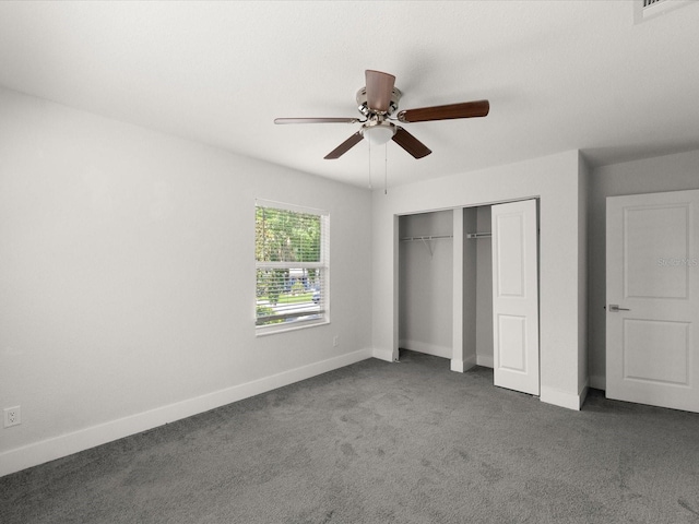 506 Dorset Cir S, Daytona, FL 32119 - unfurnished bedroom featuring carpet flooring, a closet, and a ceiling fan
