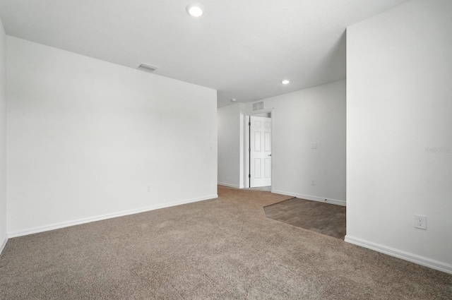 17 Roxbury Ln, Palm Coast, FL 32164 - spare room featuring carpet and recessed lighting