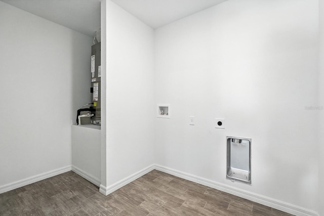 17 Roxbury Ln, Palm Coast, FL 32164 - laundry area featuring electric dryer hookup, washer hookup, and wood finished floors