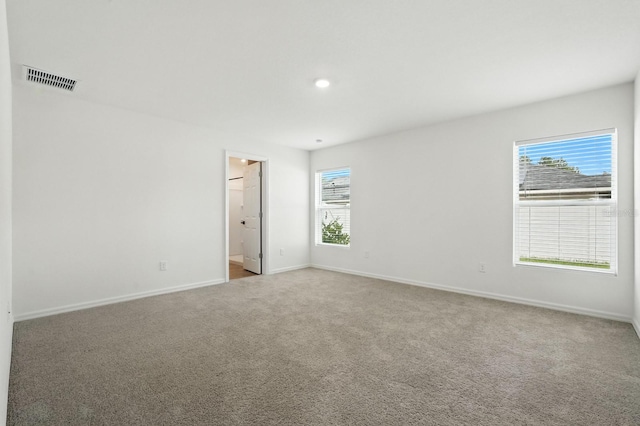 17 Roxbury Ln, Palm Coast, FL 32164 - spare room with carpet and recessed lighting