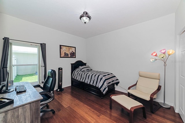 43 White Dove Ln, Palm Coast, FL 32164 - bedroom featuring wood finished floors and a desk