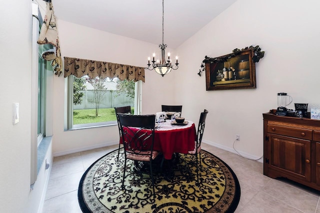 43 White Dove Ln, Palm Coast, FL 32164 - dining space featuring a chandelier and light tile patterned floors