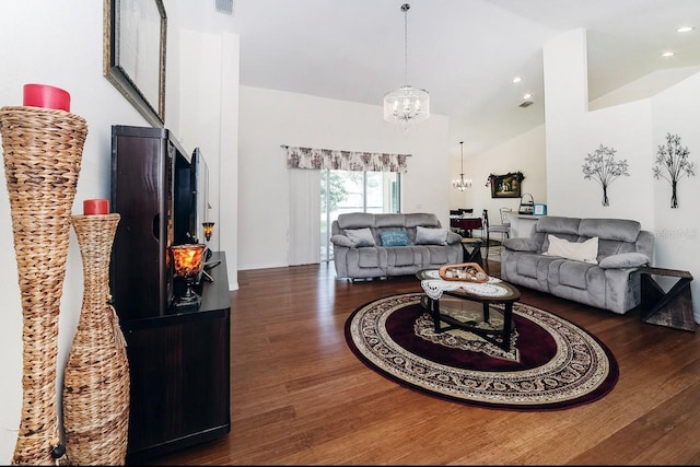 43 White Dove Ln, Palm Coast, FL 32164 - living area featuring a chandelier, wood finished floors, high vaulted ceiling, and recessed lighting