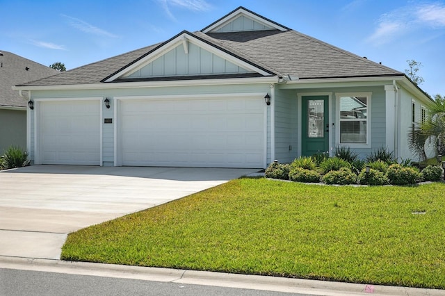 47 Lumberjack Trl, Palm Coast, FL 32137 - view of front facade with a garage, concrete driveway, board and batten siding, and a front yard