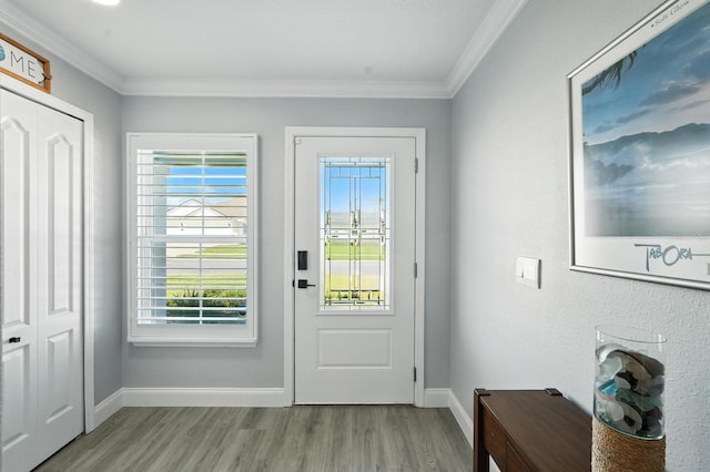 47 Lumberjack Trl, Palm Coast, FL 32137 - doorway with wood finished floors and crown molding