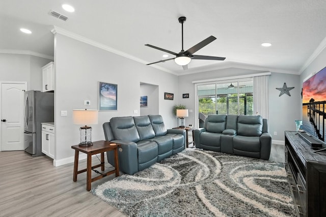 47 Lumberjack Trl, Palm Coast, FL 32137 - living room featuring ceiling fan, light wood-style floors, ornamental molding, recessed lighting, and lofted ceiling