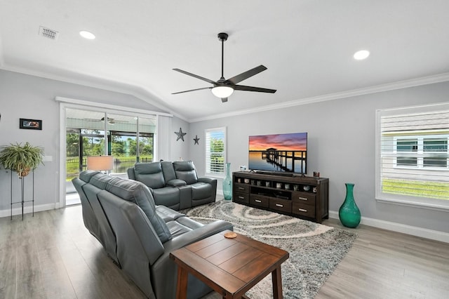 47 Lumberjack Trl, Palm Coast, FL 32137 - living room featuring wood finished floors, ceiling fan, lofted ceiling, crown molding, and recessed lighting
