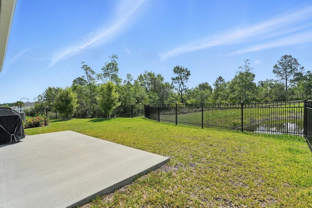 47 Lumberjack Trl, Palm Coast, FL 32137 - fenced backyard with a patio