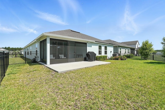 47 Lumberjack Trl, Palm Coast, FL 32137 - back of property featuring a sunroom, a fenced backyard, a patio area, and stucco siding