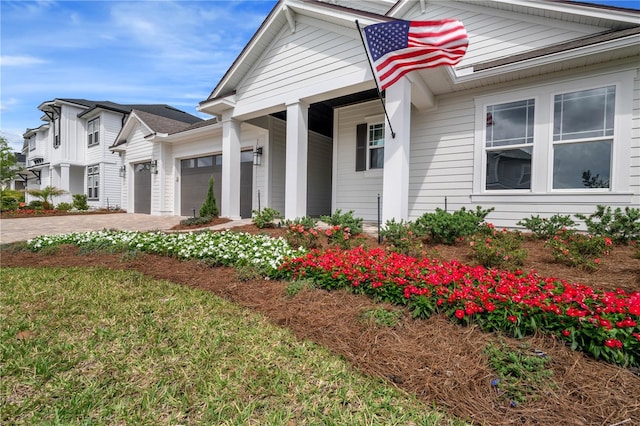 233 Yorkshire Dr, Saint Augustine, FL 32092 - view of front facade with a garage and driveway