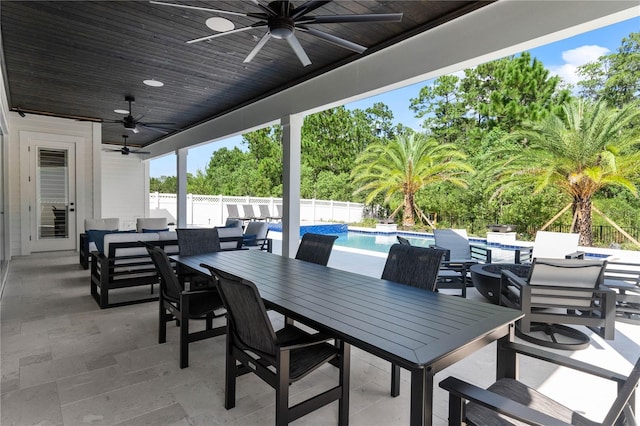 233 Yorkshire Dr, Saint Augustine, FL 32092 - fenced backyard with outdoor dining space, ceiling fan, a patio, and an outdoor living space