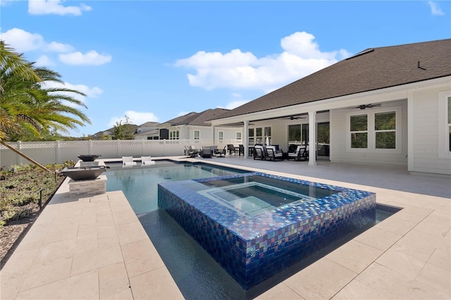 233 Yorkshire Dr, Saint Augustine, FL 32092 - view of swimming pool featuring a ceiling fan, a fenced backyard, a patio, and a pool with connected hot tub