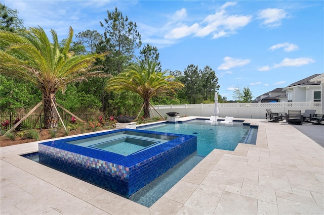 233 Yorkshire Dr, Saint Augustine, FL 32092 - view of pool with an in-ground hot tub, a patio area, and a fenced backyard