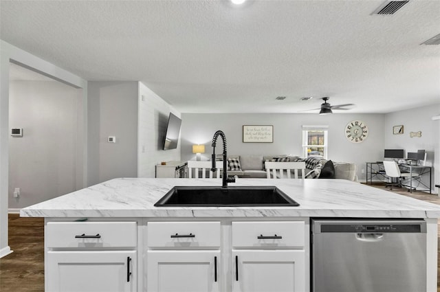 7 Grand Par Ct, Bunnell, FL 32110 - kitchen featuring dishwasher, open floor plan, ceiling fan, a textured ceiling, and dark wood finished floors
